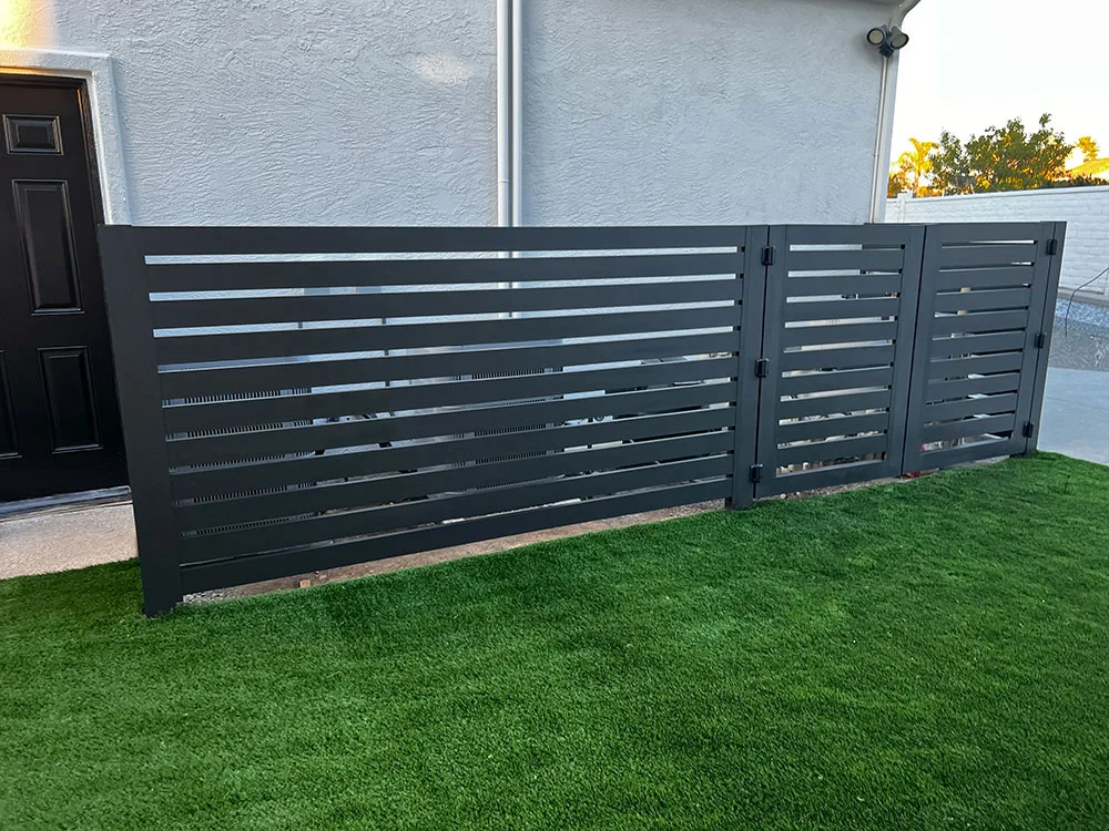 Elite L.A. Patios - The Modern Look of Aluminum Fencing: A Homeowner’s Guide - horizontal slat aluminum privacy gate