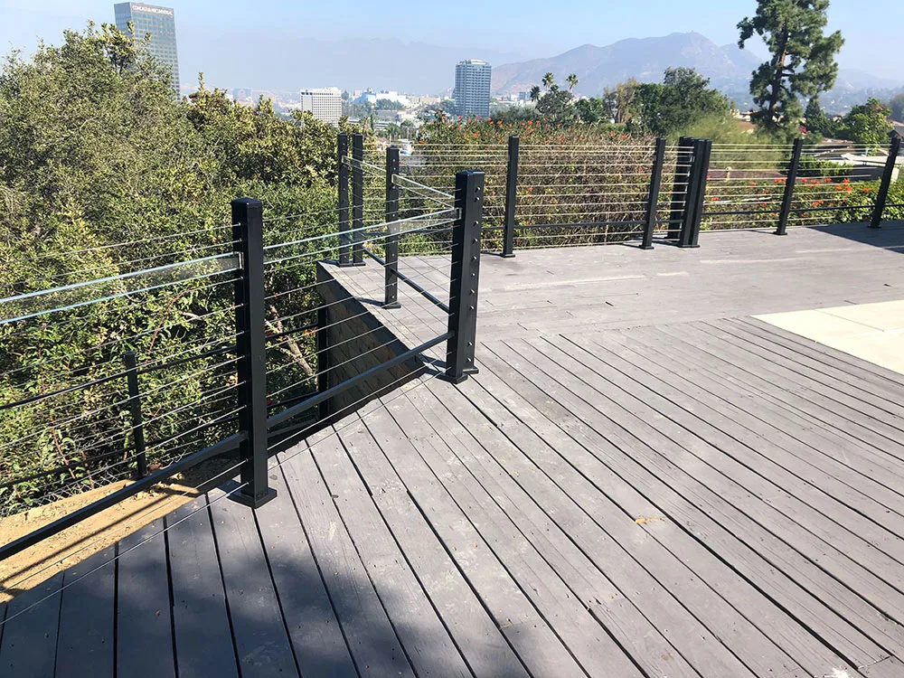 Elite L.A. Patios - The Modern Look of Aluminum Fencing: A Homeowner’s Guide - modern cable railing on deck